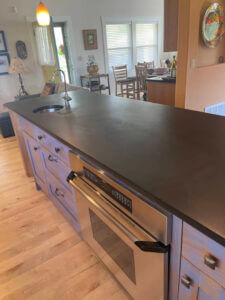 A slate kitchen counter that has been honed and sealed